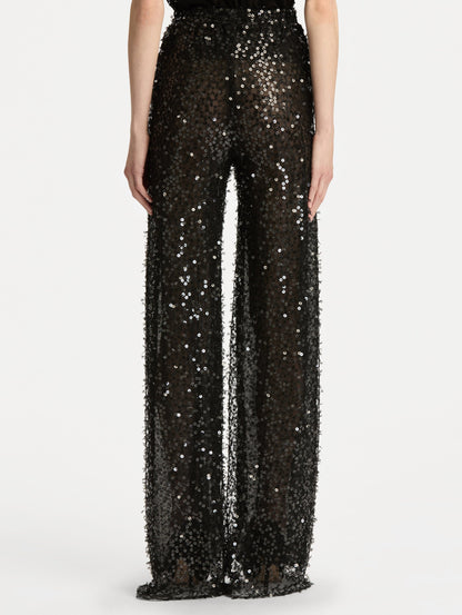 Black Floating Sequin Pant with high waist and wide leg silhouette. Back View.