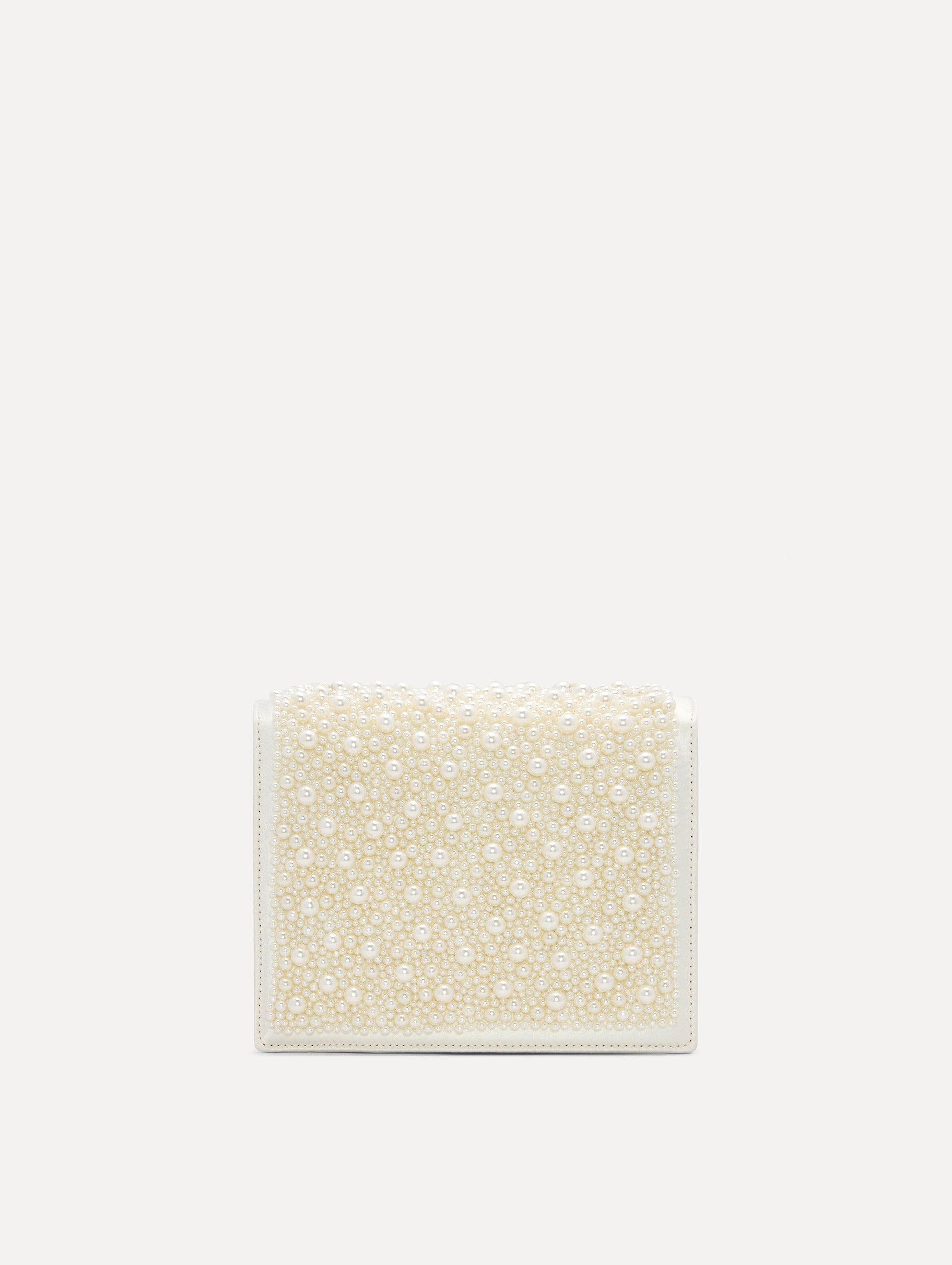 Pearl Embroidered Mini TRO Bag in White with detachable shoulder strap and flower motif at the clasp. Back View