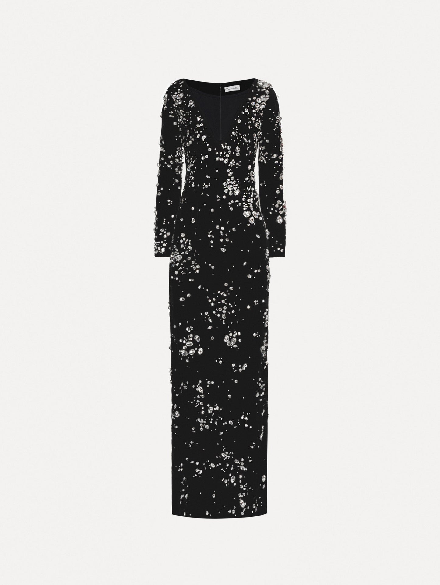 Long sleeve black gown with multi-dimensional stones scattered across the dress, features plunging V-neckline and column silhouette.