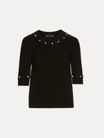 Short sleeve black pullover with a crew neckline and intricate sequin embroidery of ivory and noir florets which trace the trim