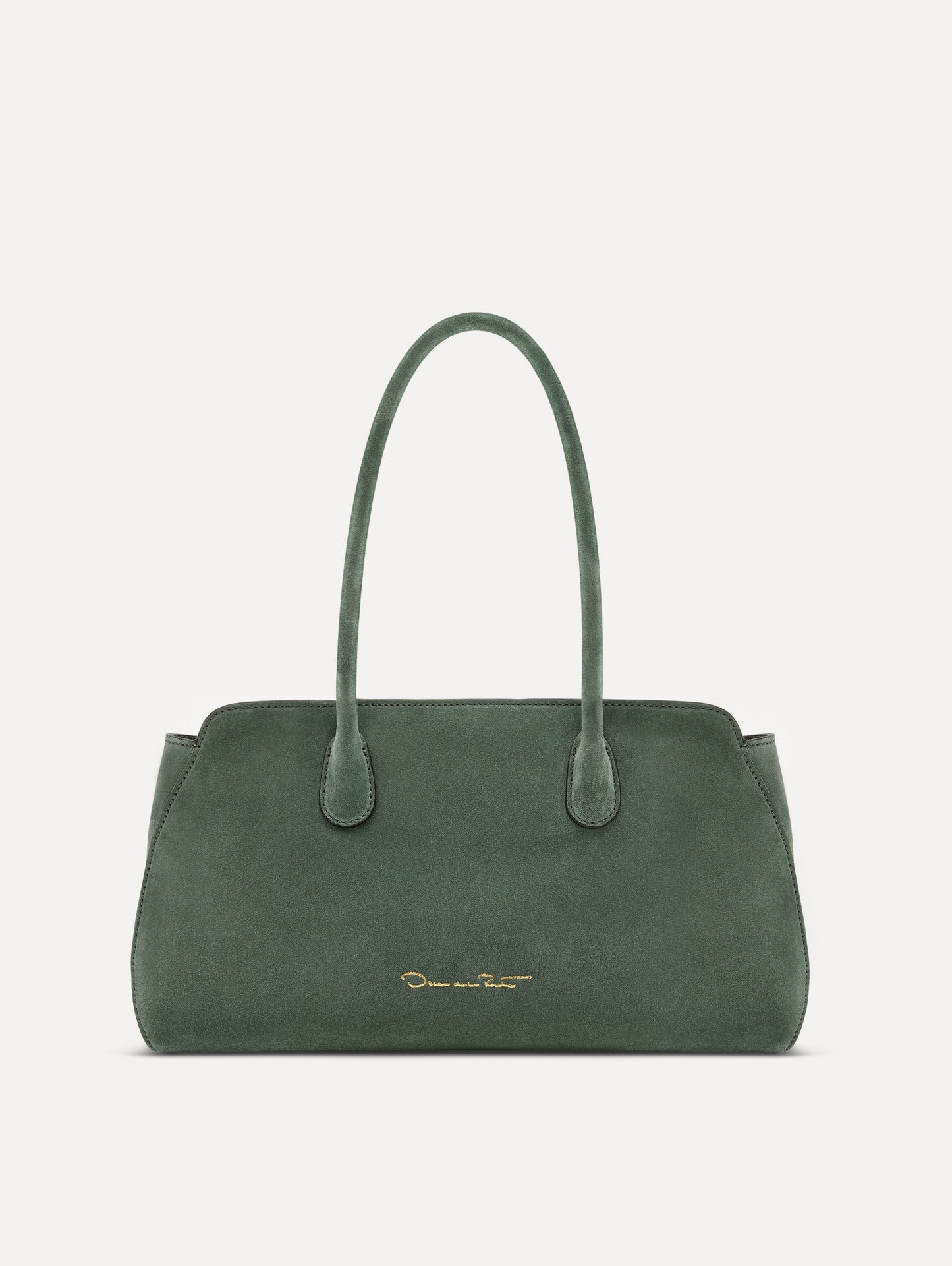 Back view of The Aster in sage which unites decisive lines and gently curved sides with the contours of the Oscar 'O.' Elongated top handles with gold hardware and an emblem-stamped tag.