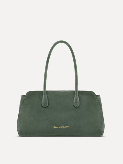 Back view of The Aster in sage which unites decisive lines and gently curved sides with the contours of the Oscar 'O.' Elongated top handles with gold hardware and an emblem-stamped tag.