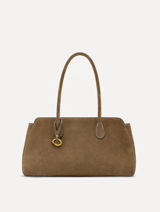 The Aster in taupe features decisive lines and gently curved sides that mimic the Oscar 'O.' Elongated top handles and gold hardware and an emblem-stamped tag.