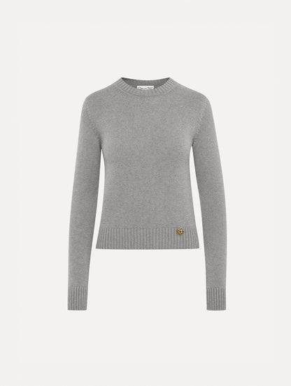 Light grey pullover with long sleeves and a crew neckline. Features gold 'O' Flower emblem made of the interlocking Oscar 'O'.