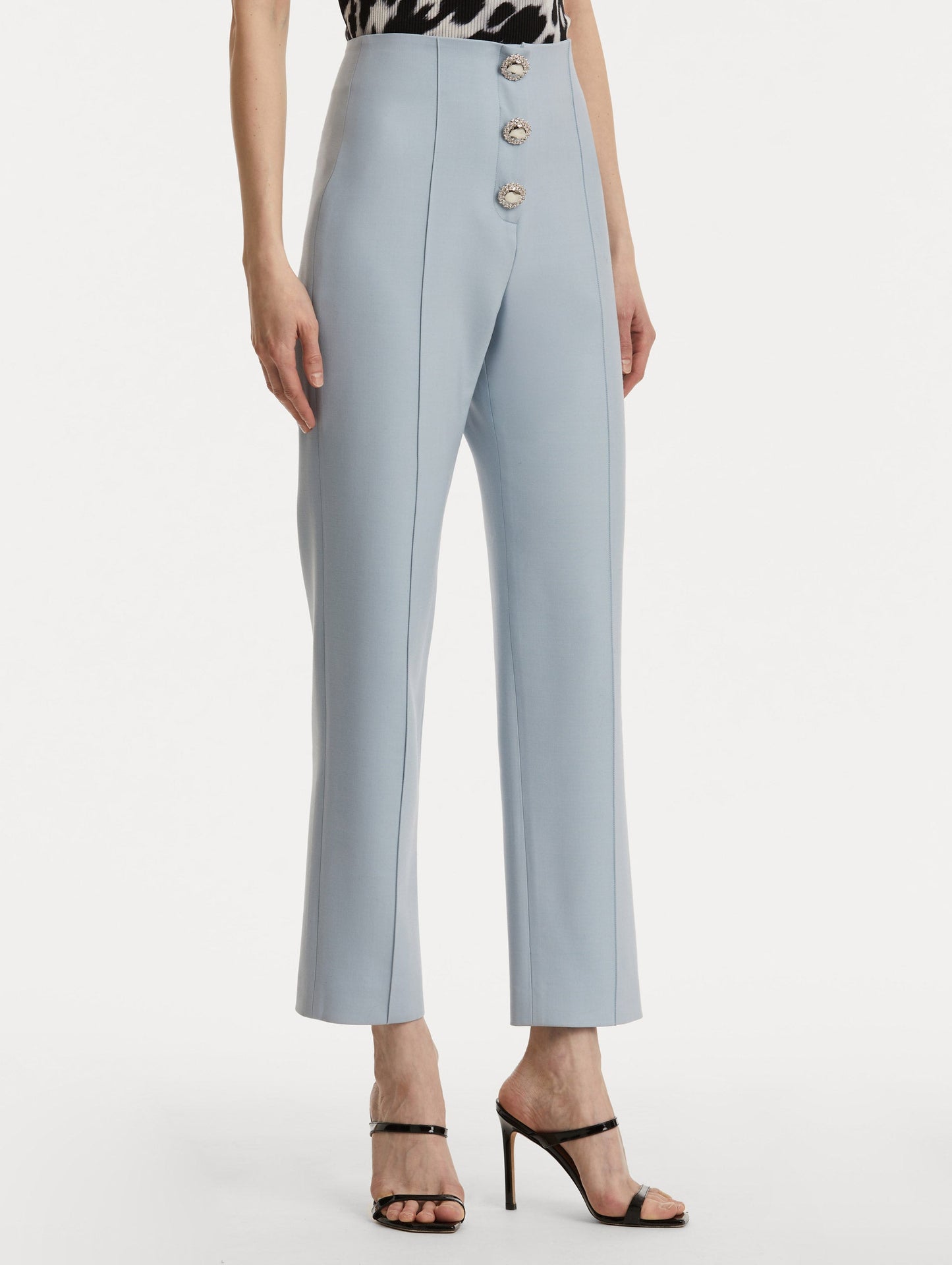 Button-Detailed Wool Pant in Soft Blue/ Silver. Side View.