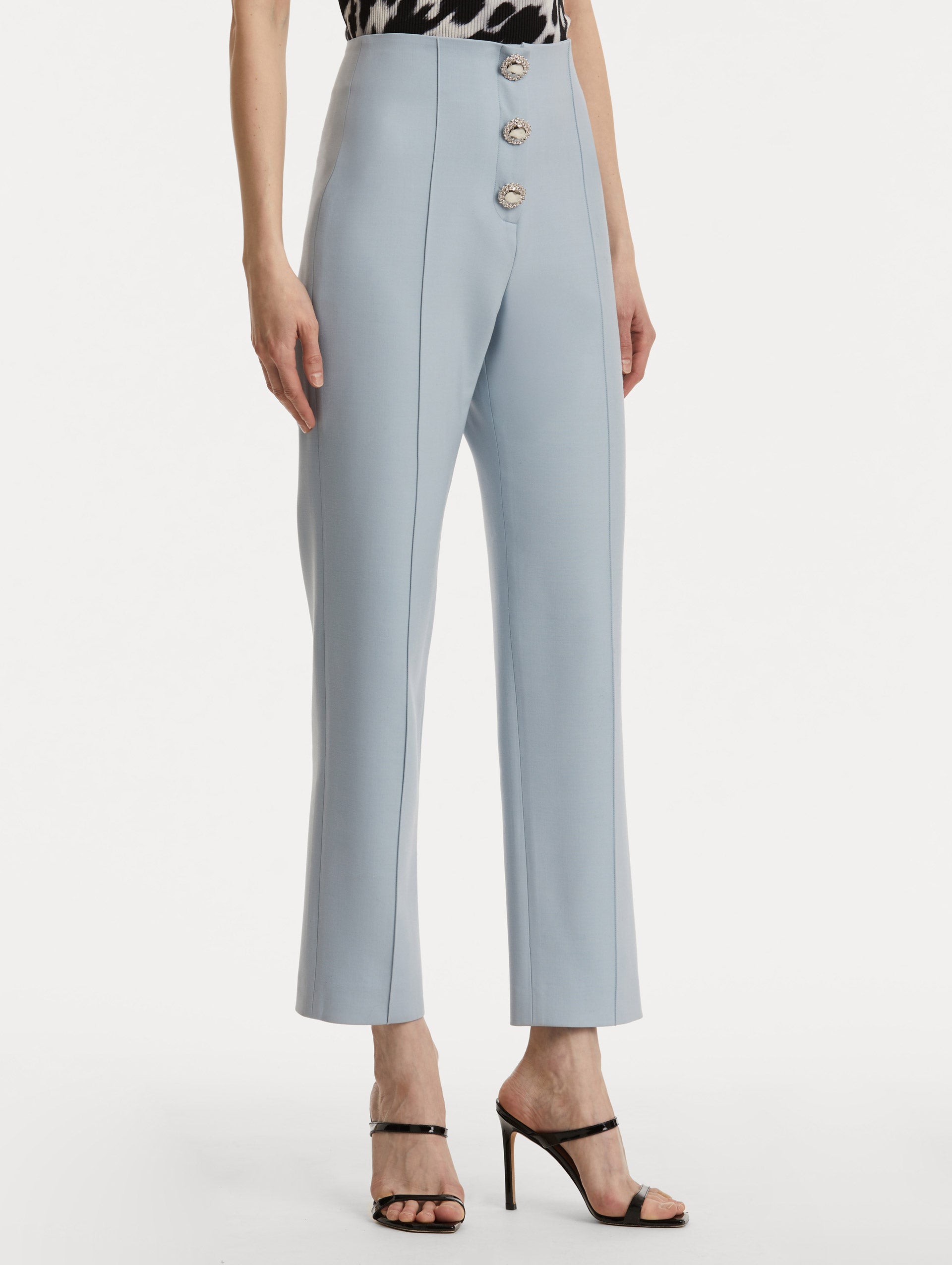 Button-Detailed Wool Pant in Soft Blue/ Silver. Side View.
