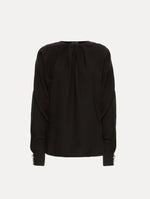 Black long sleeve top.