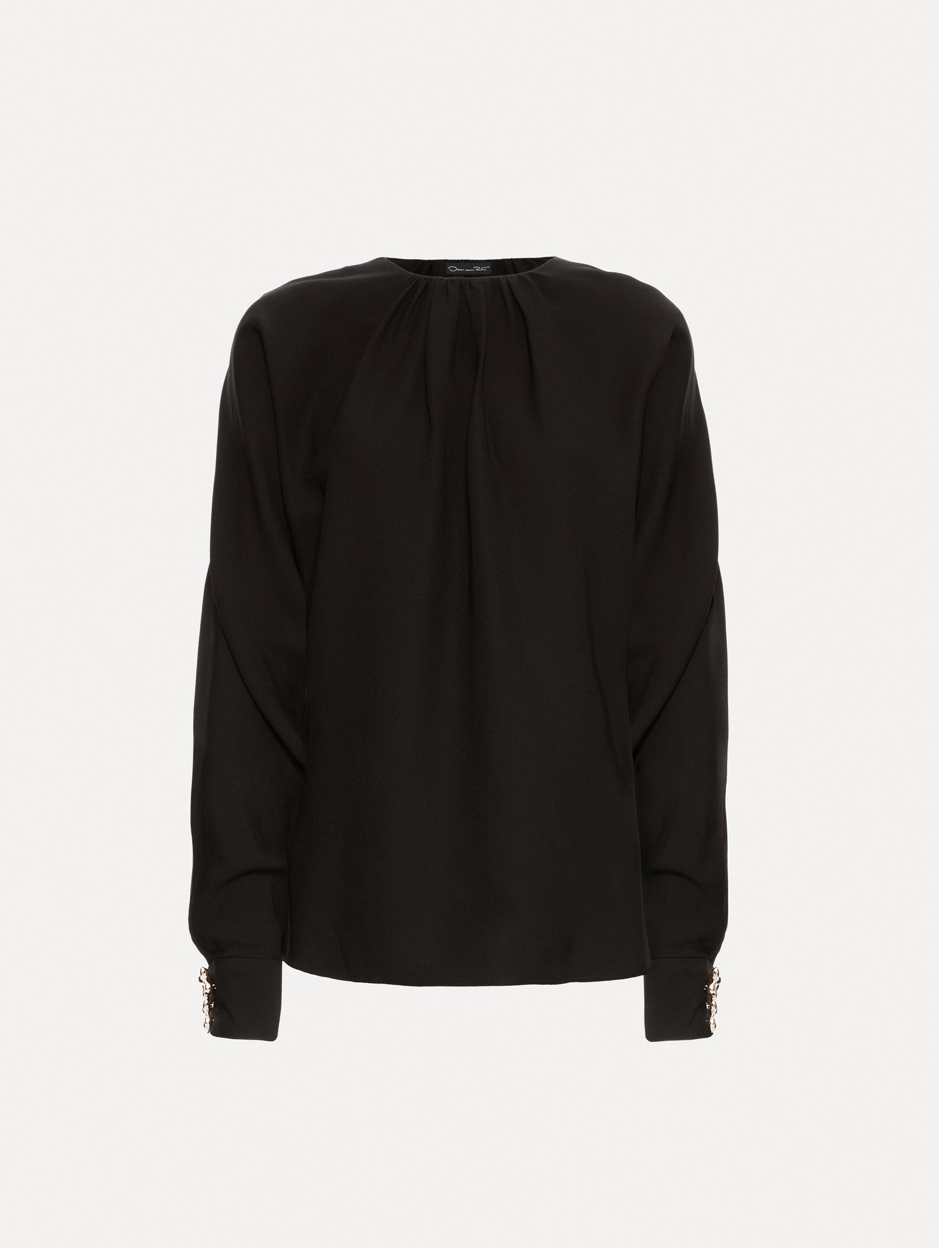 Black long sleeve top.