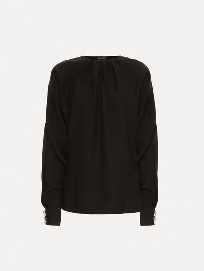 Black long sleeve top.