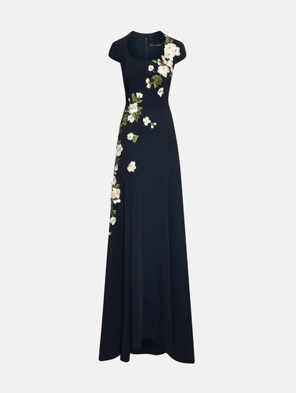 Short sleeve navy gown with white cherry blossoms embroidered. Front view