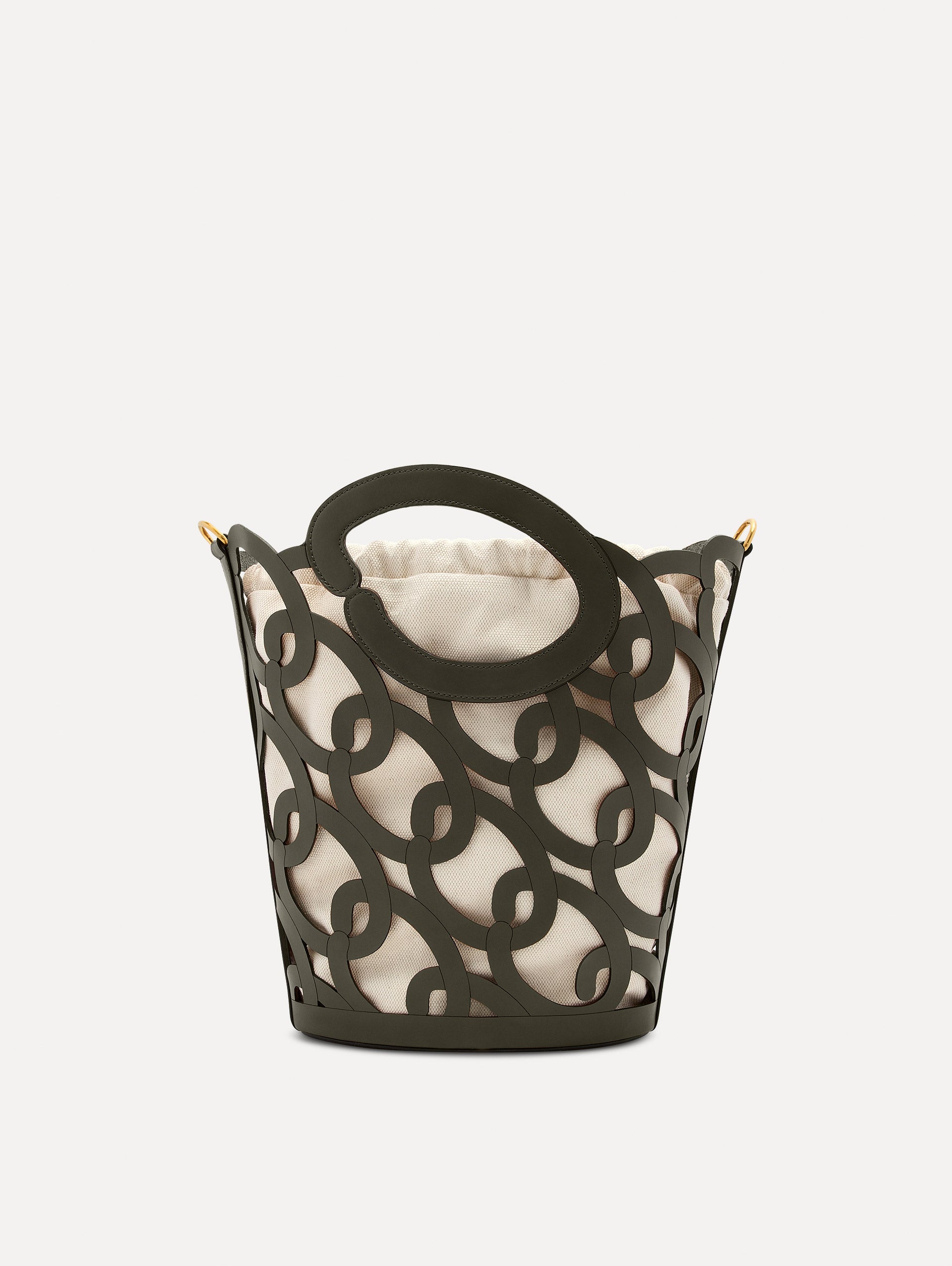 The Oscar chain link bucket tote in olive green with a large o forming the top handle and detachable shoulder strap, paired with an ombre floral dress. Front View.