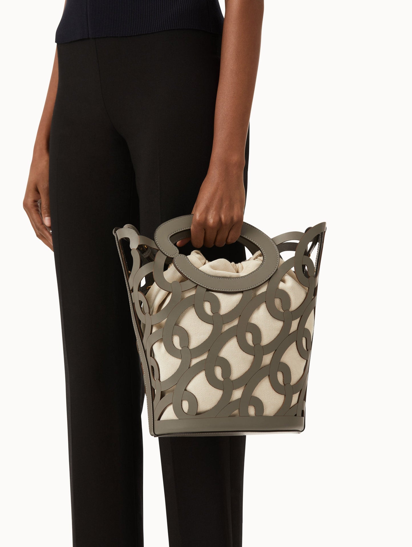 Oscar chain link bucket tote in grey with a large o forming the top handle and detachable shoulder strap. Front View.