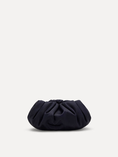 Small satin clutch in taupe with a bow detail on the top. Back View.