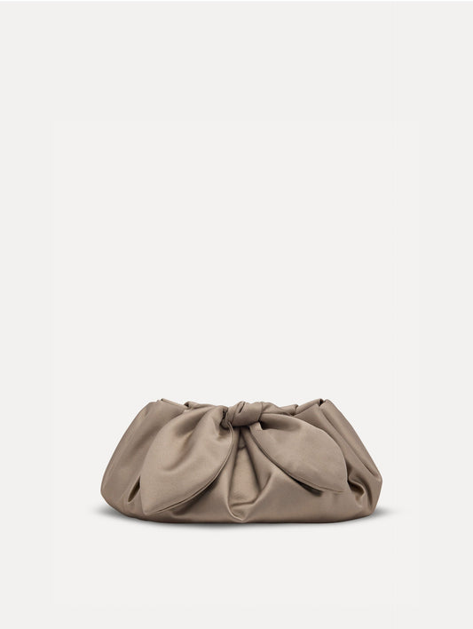 Small satin clutch in taupe with a bow detail on the top. Front View.