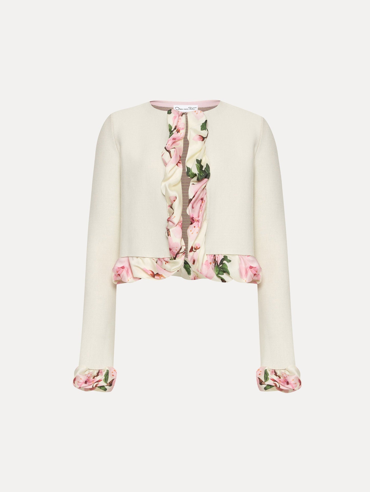 White cardigan with pink bubble twist trim printed with cherry blossoms