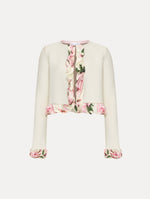 White cardigan with pink bubble twist trim printed with cherry blossoms