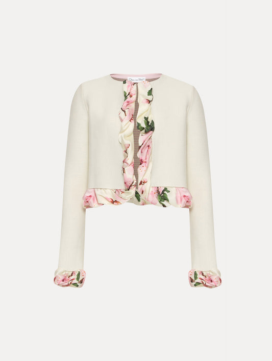 White cardigan with pink bubble twist trim printed with cherry blossoms