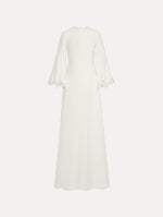White long sleeve caftan with lace detail on the cuff of the bell sleeve. Front view.