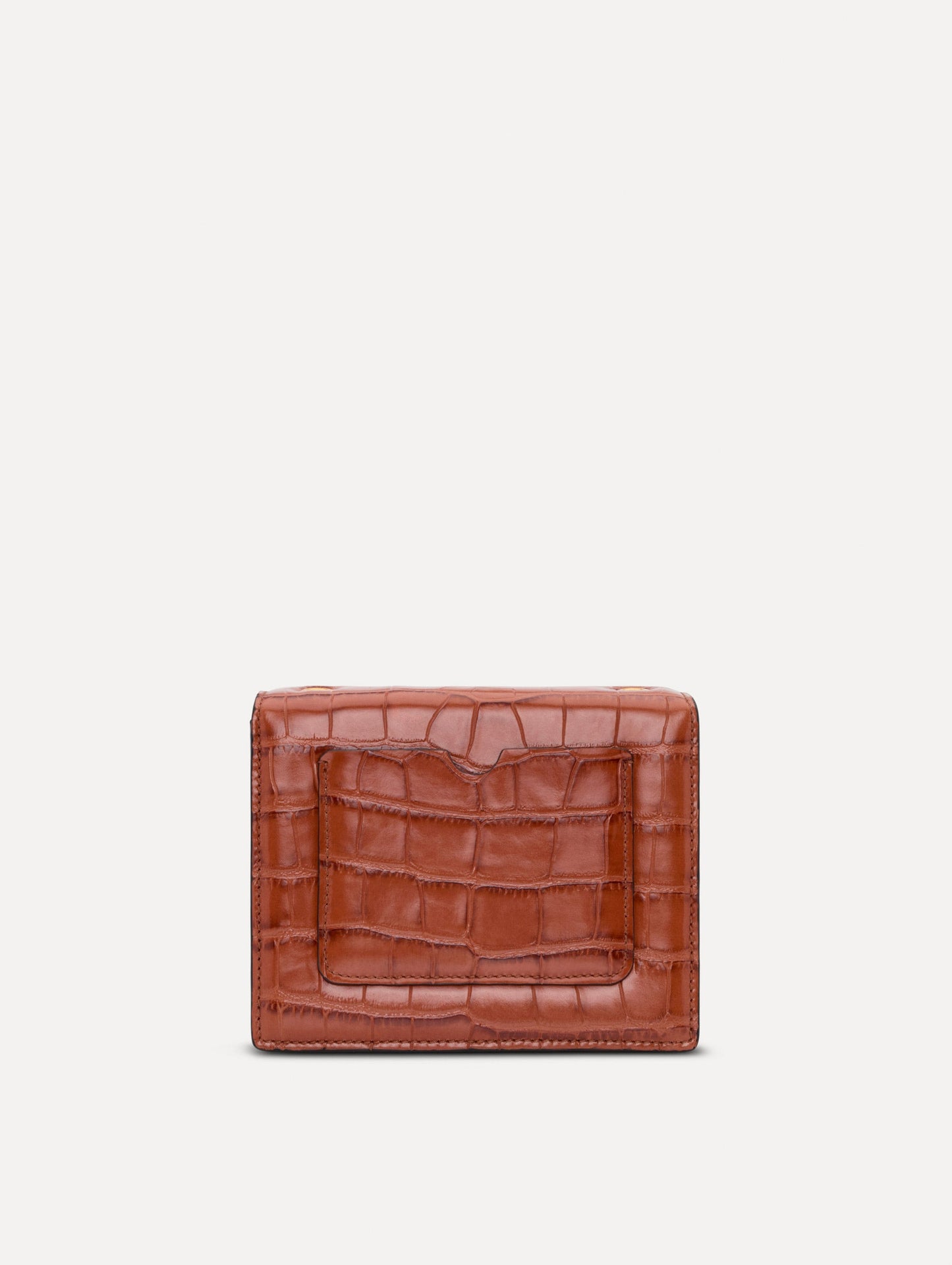 The Embossed Mini TRO Bag in the color cognac. Back view.
