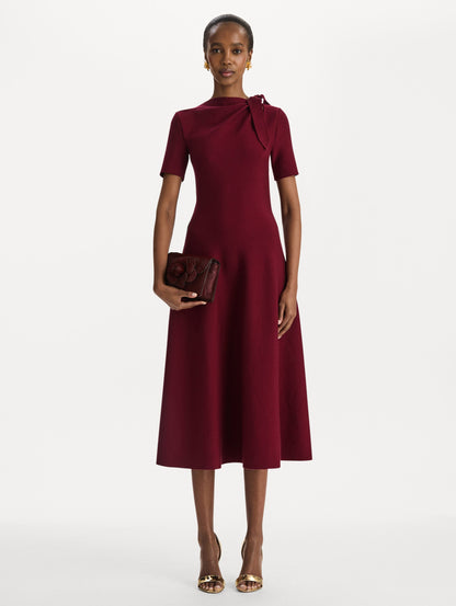 The Haircalf Mini TRO Bag in the color bordeaux. Front view.