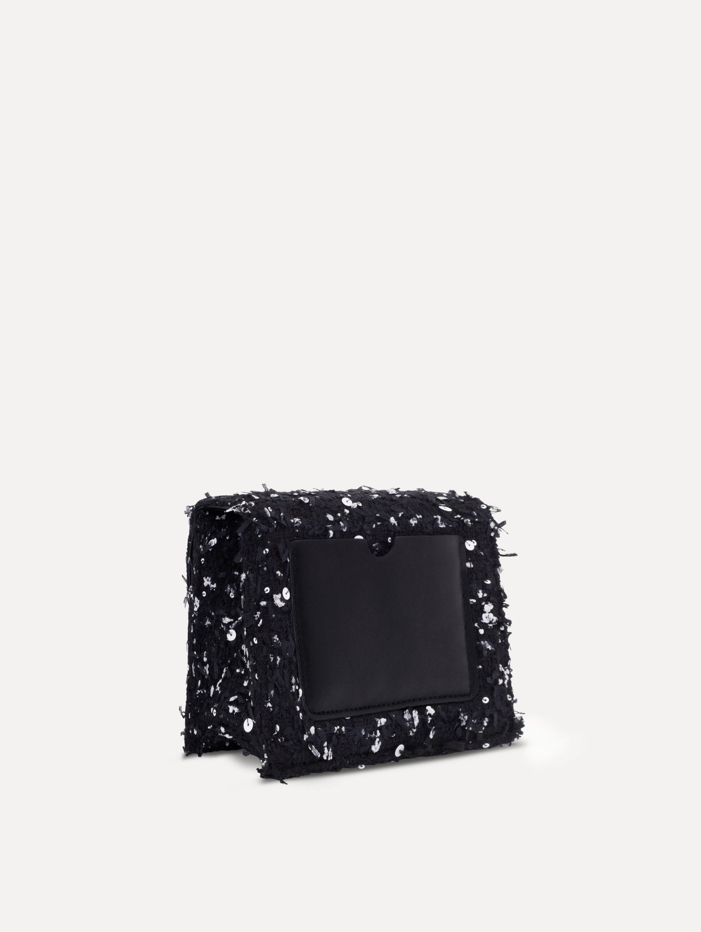 The Sequin Ribbon Tweed Mini TRO Bag in black. Back view.