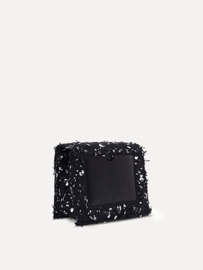 The Sequin Ribbon Tweed Mini TRO Bag in black. Back view.