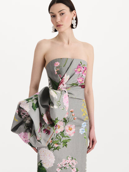 The model is wearing the mixed botanical drape-detailed faille gown with a strapless silhouette in the color grey multi. Zoom view.