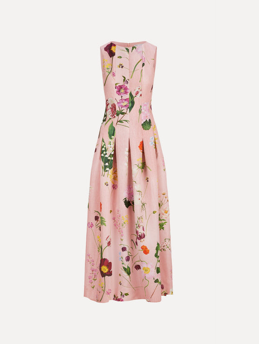 The model is wearing Mixed Botanical Faille Sleeveless Gown with a classic floor-length silhouette in blush multi.