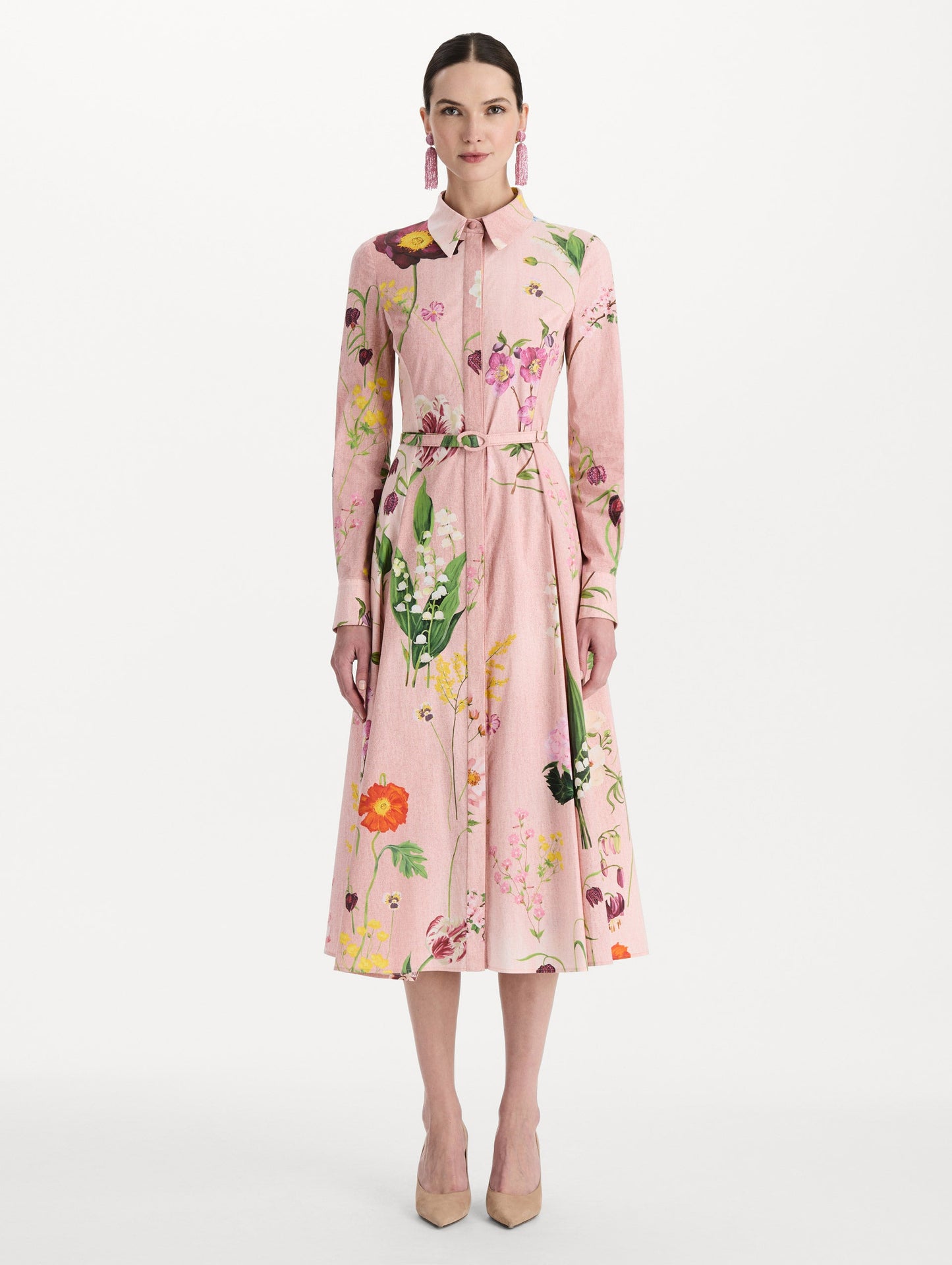 The model is wearing the mixed botanical cotton poplin dress with a collared neckline, long sleeves, and an all-over floral print in blush multi. Front view.