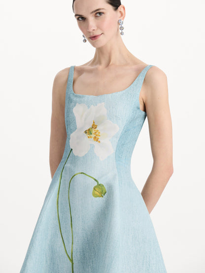 The model is wearing the ombré peony faille dress with a sleeveless scoop neckline in white and blue. Zoom view.