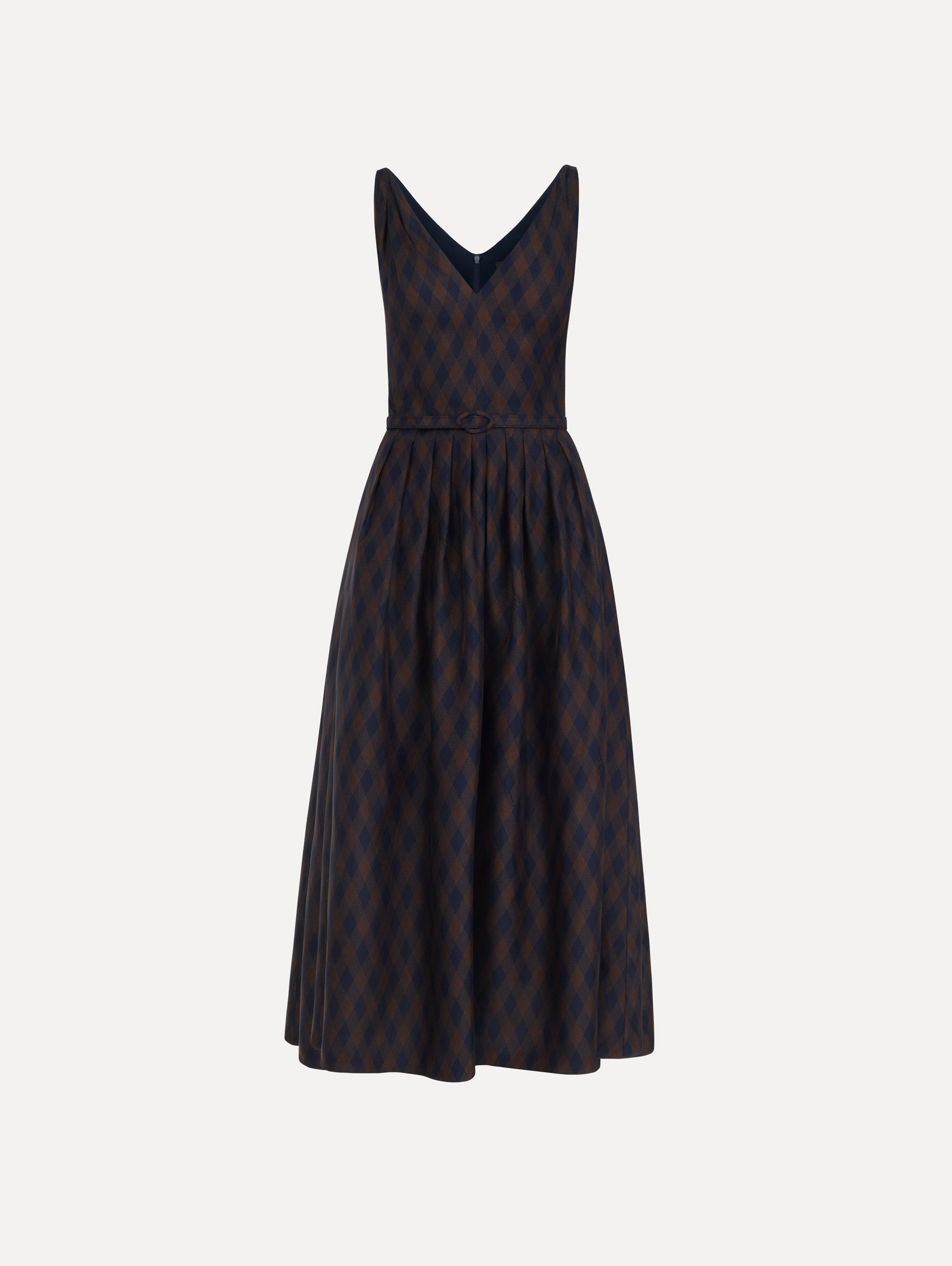 The model is wearing the argyle silk twill dress with a sleeveless silhouette, a V-neckline, and an argyle print in navy and brown.