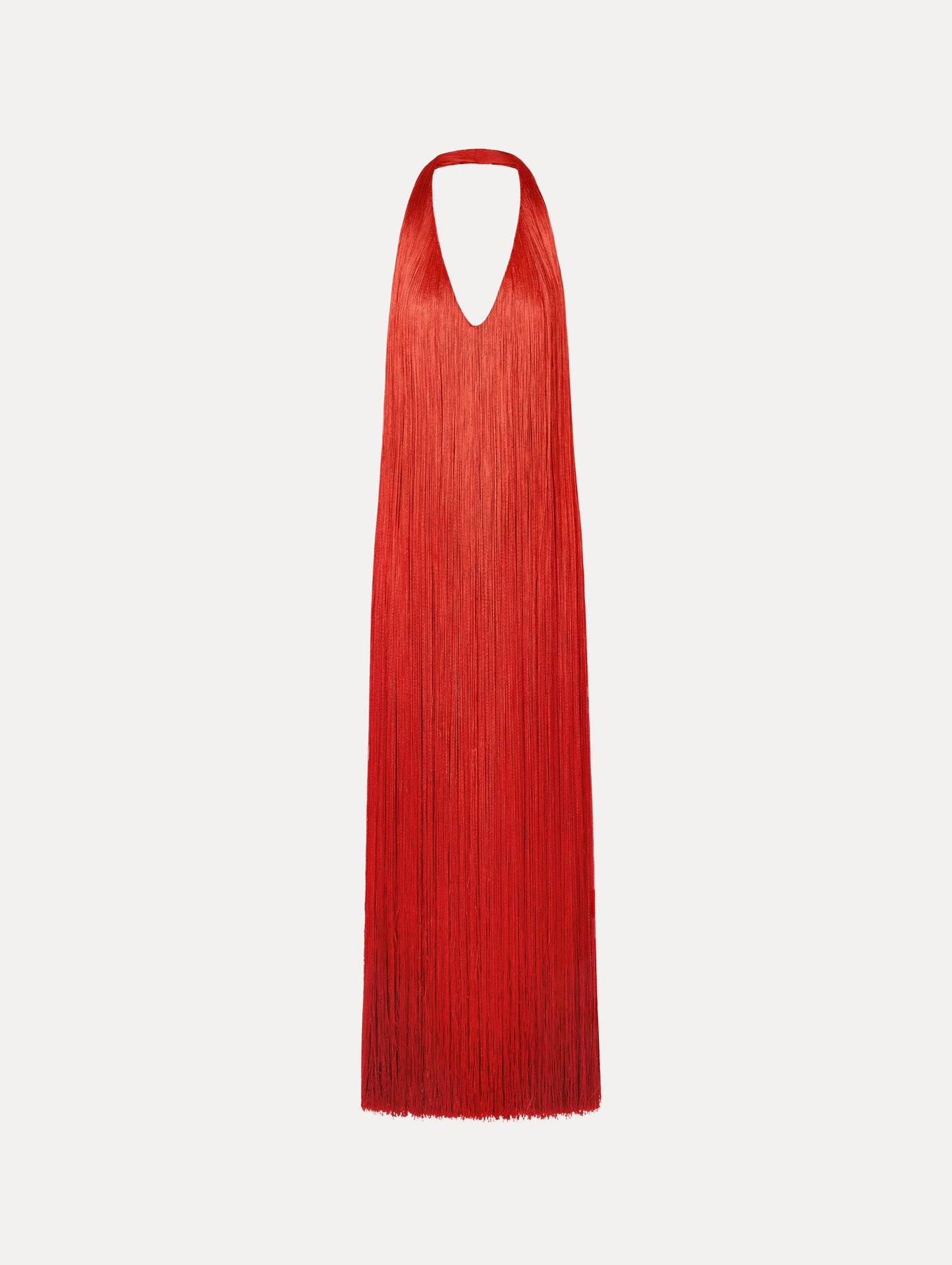 The Ombré Fringe Gown in Paprika Red. Featuring a deep, halter neckline, and full fringe silhouette. Front View.