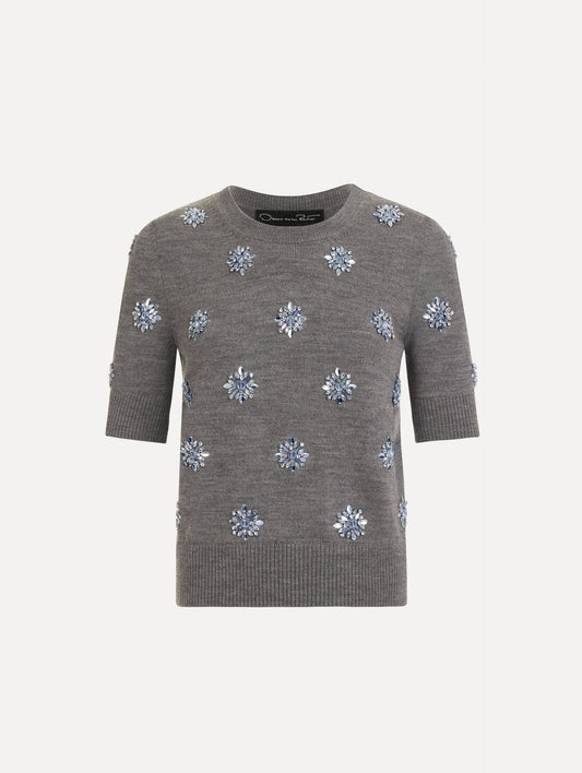 The Crystal Embroidered Pullover in grey with blue crystal embroidered. Featuring a crew neckline and ribbed trims. Front View.