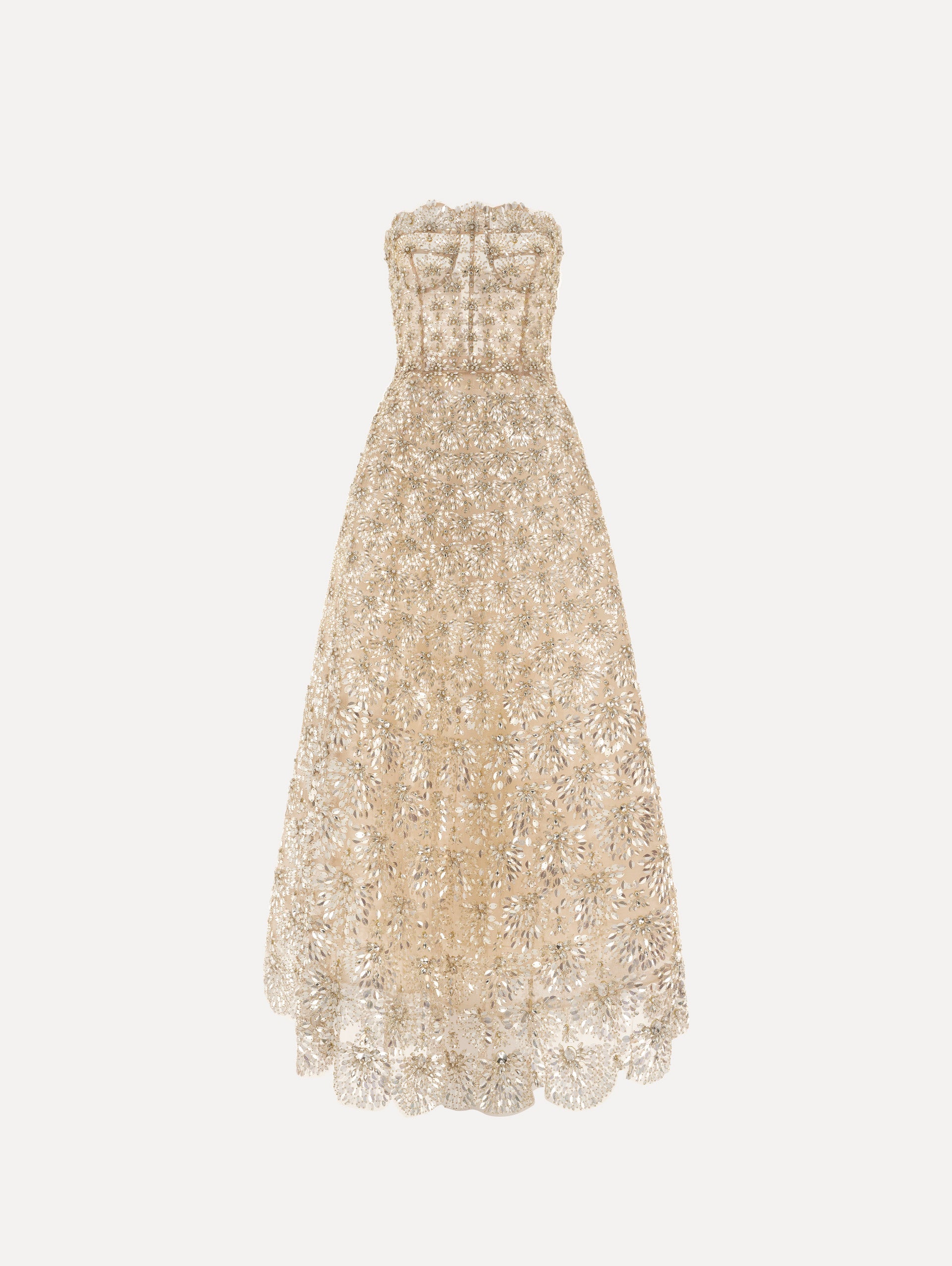 The model is wearing the crystal & glass embroidered gown with a strapless fit-and-flare silhouette in the color lemonade.