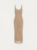 The model is wearing the crystal & glass embroidered cocktail dress with a scoop neckline in the color amber.