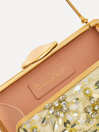 The Crystal & Glass Embroidered O Minaudière in Gold and Crystal Embroidery. Detail View.
