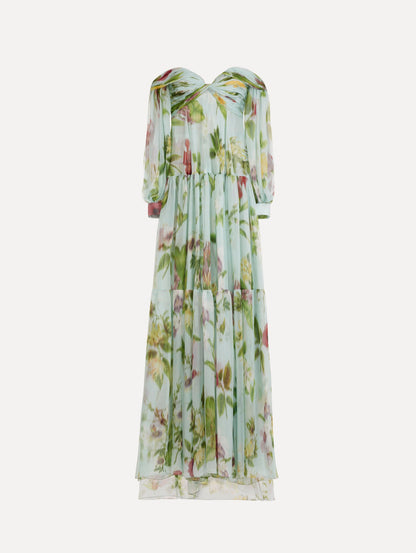 The Chiné Dominican Mixed-Floral Chiffon Sweetheart Gown. Featuring an off-the-shoulder sweetheart neckline, long sleeves, and flowing, tiered skirt. Front View.