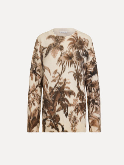 The Chiné Palm Leaves Oversized Pullover in ivory printed with brown palm leaves. Featuring a relaxed silhouette, crew neckline, and ribbed trims. Front View.