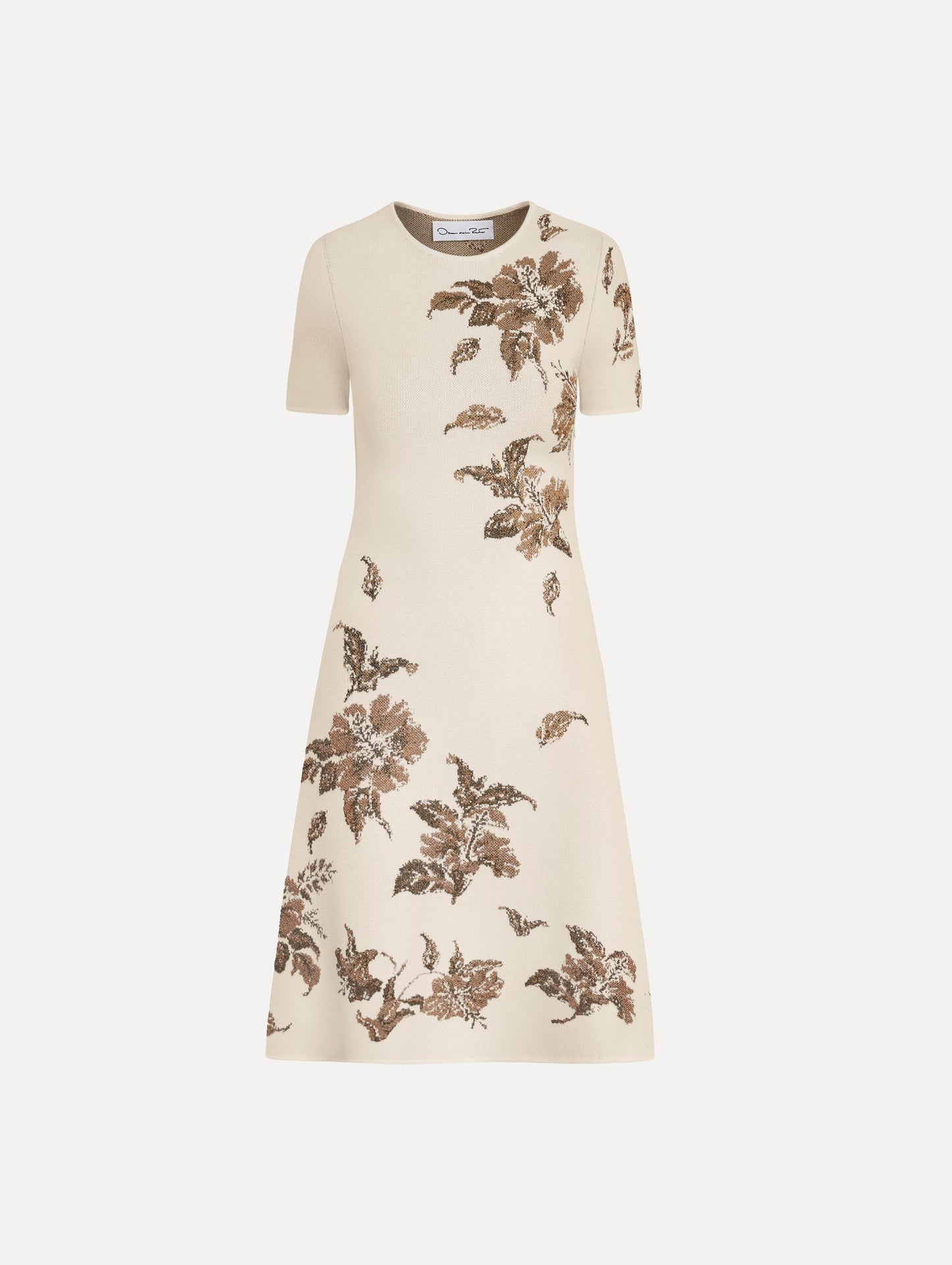 The Hibiscus Metallic Jacquard Dress in Ivory with Gold hibiscus motifs. Featuring short sleeves, a softly structured silhouette, and mini-length skirt. Front View.