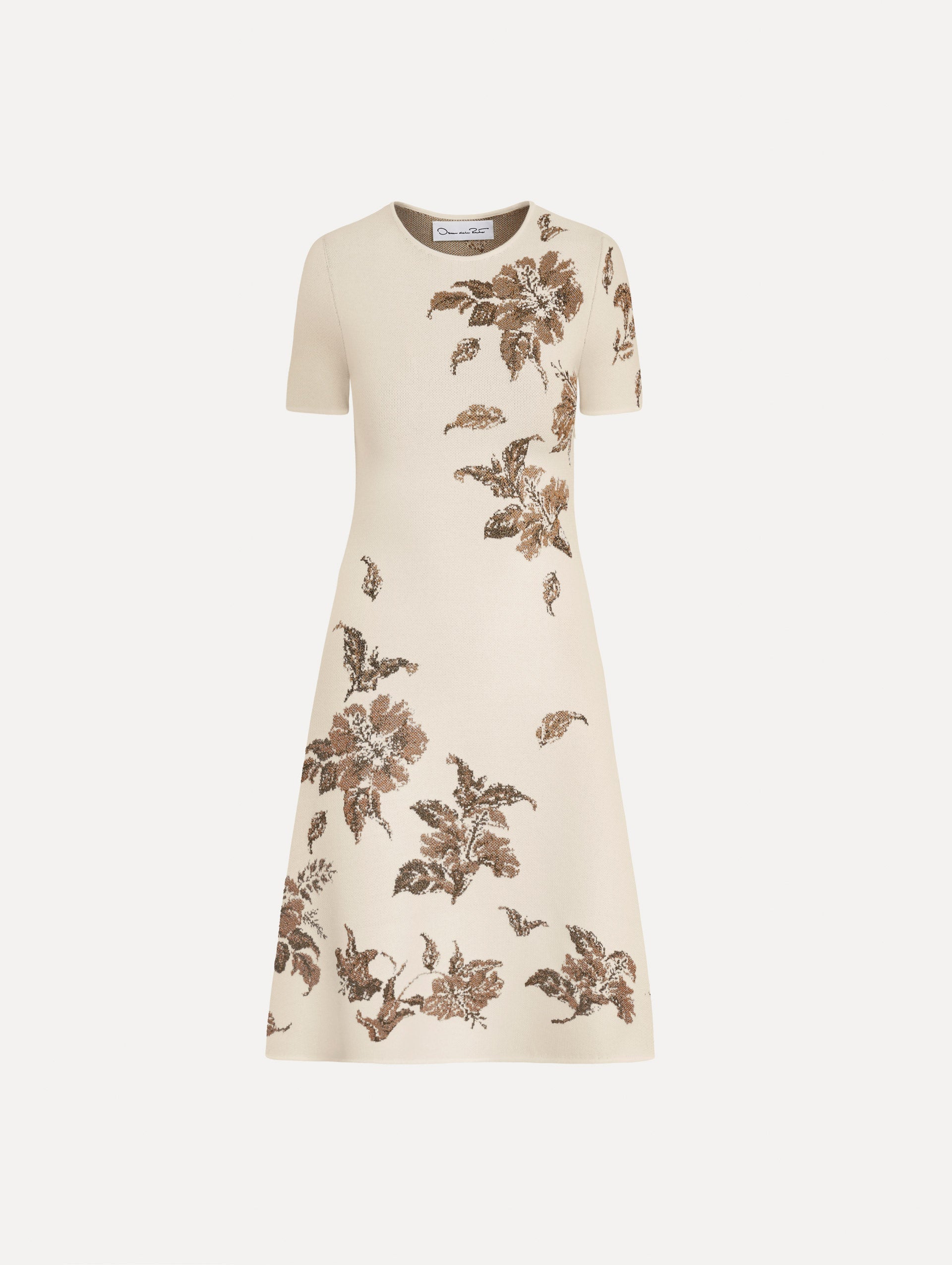 The Hibiscus Metallic Jacquard Dress in Ivory with Gold hibiscus motifs. Featuring short sleeves, a softly structured silhouette, and mini-length skirt. Front View.