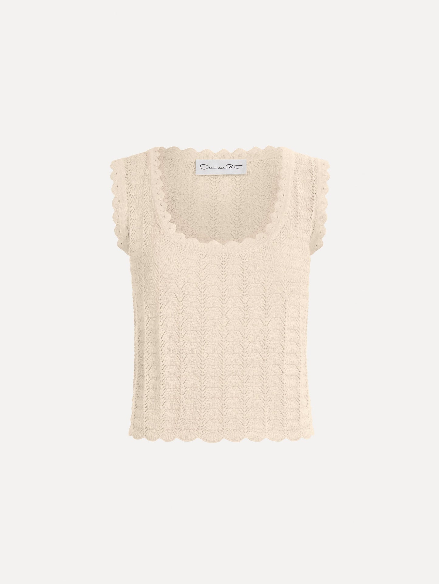The Pointelle Weave Tank in Ivory. Featuring a scoop neckline, thick tank straps, and scalloped edges. Front View.