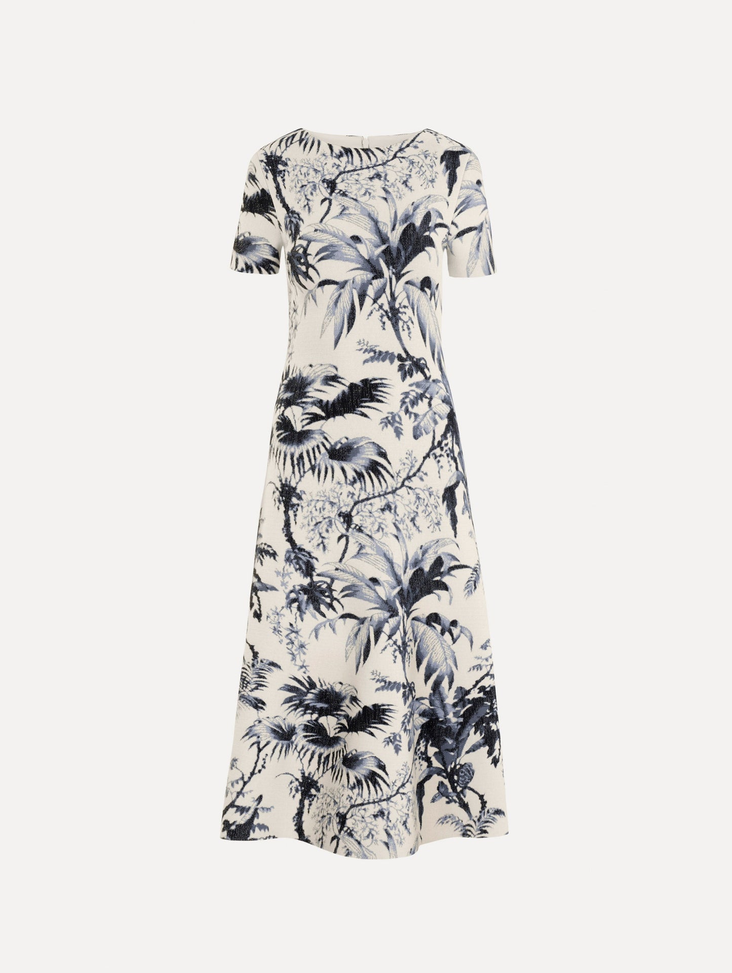 The Chiné Palm Leaves Knit Dress in Navy and Ivory. Featuring a classic silhouette with short sleeves and an A-line midi skirt. Front View.