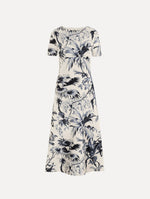 The Chiné Palm Leaves Knit Dress in Navy and Ivory. Featuring a classic silhouette with short sleeves and an A-line midi skirt. Front View.