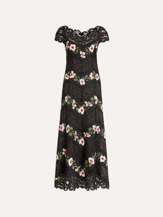 The Chiné Hibiscus Striped Faille Midi Dress in Black. Featuring off-the-shoulder cap sleeves, a midi length, and woven hibiscus motifs alternating with panels of faille and guipure lace, creating a striped composition. Front View.