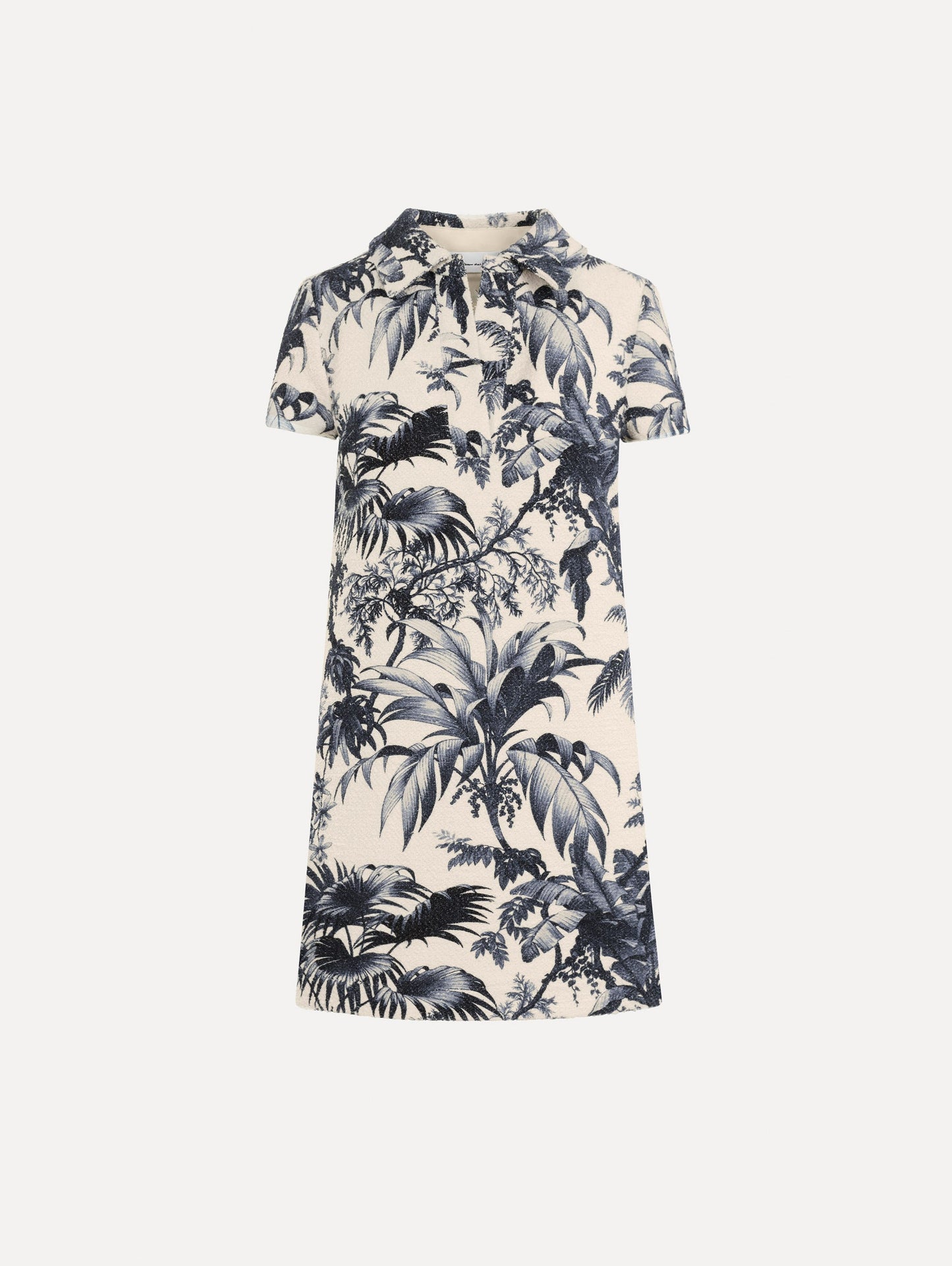 The Chiné Palm Leaves Shift Dress in ivory printed with navy palm leaves. Featuring a classic collar neckline, short sleeves, and mini length. Front View.