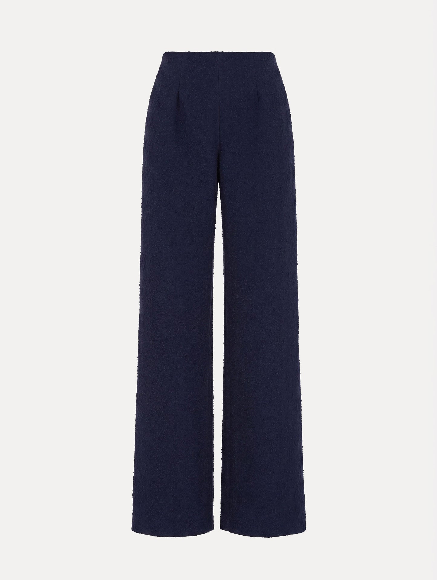 The model is wearing the slub wool tweed wide-leg pant in the color navy.