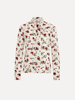 The Hibiscus Silk Chiffon Blouse in white printed with red hibiscus florals. Featuring a tie at neckline, long sleeves, and tailored silhouette. Front View.