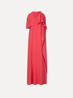 The Hibiscus Brooch Georgette Caftan in Hot Pink. Featuring a softly structured cape silhouette and a sculptural hibiscus brooch accent at the shoulder. Front View.