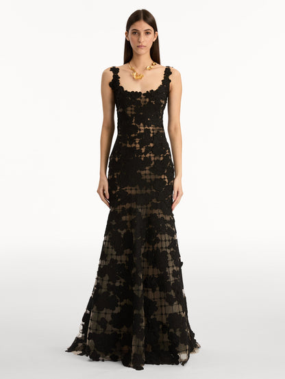 Black Floral Cutout Threadwork Gown with semi sheer floral pattern and flared floor length hem line. Front View.