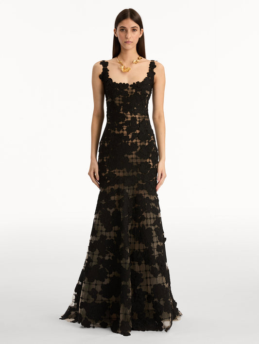 Black Floral Cutout Threadwork Gown with semi sheer floral pattern and flared floor length hem line. Front View.